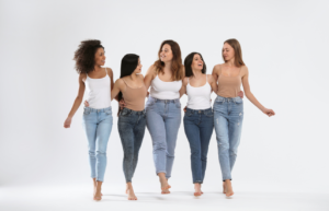 Women with different body types in a line with white background.